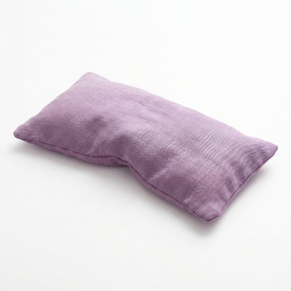 A rectangular lavender pillowcase made of textured, slightly wrinkled linen-like fabric, photographed on a clean white background.